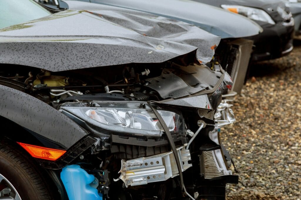 crash auto body automobile accident on street, damaged cars after collision Car accident settlement Los Angeles